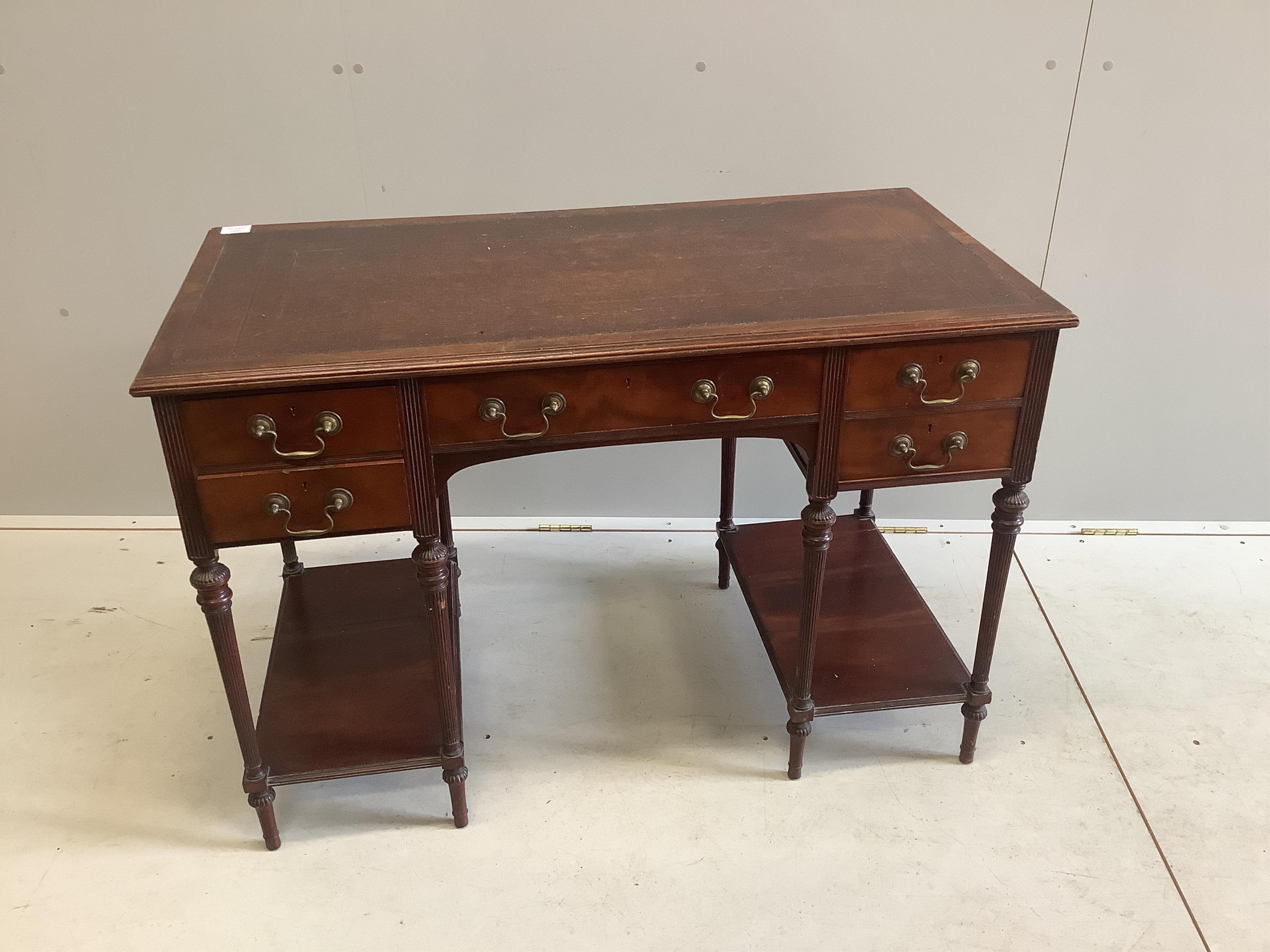 A late Victorian mahogany kneehole writing table by Collinson & Lock, width 109cm, depth 55cm, height 74cm. Condition - fair to good